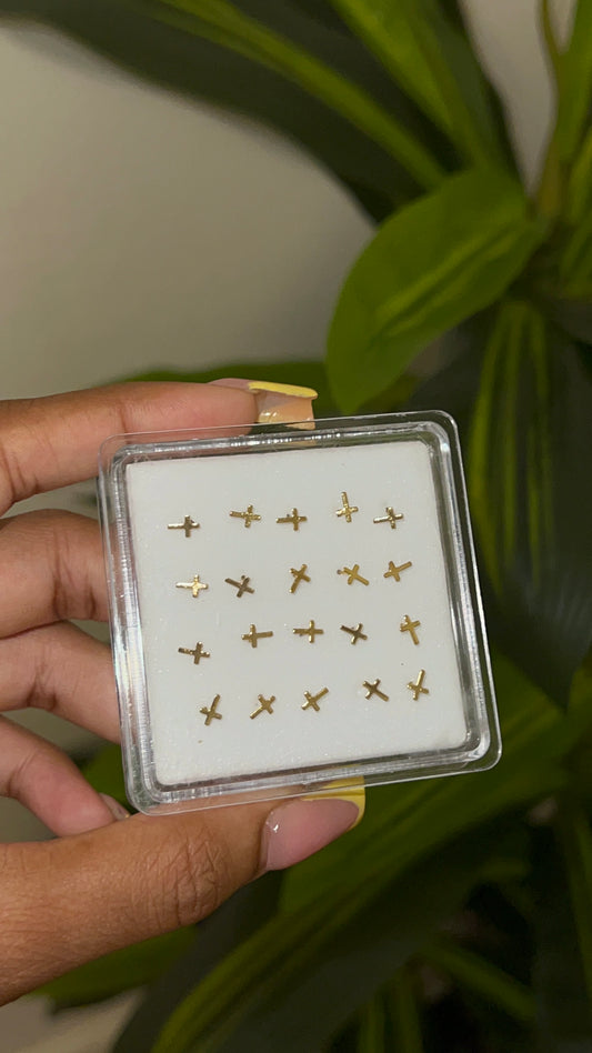 gold cross nose stud
